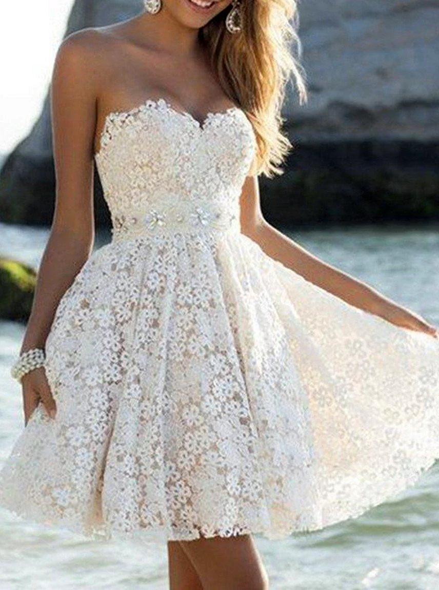 Весільні сукні короткі