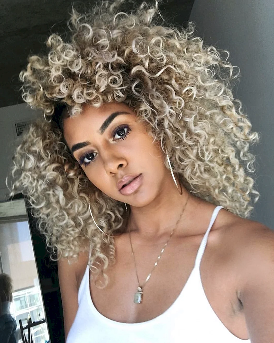 Афролокони Катрін