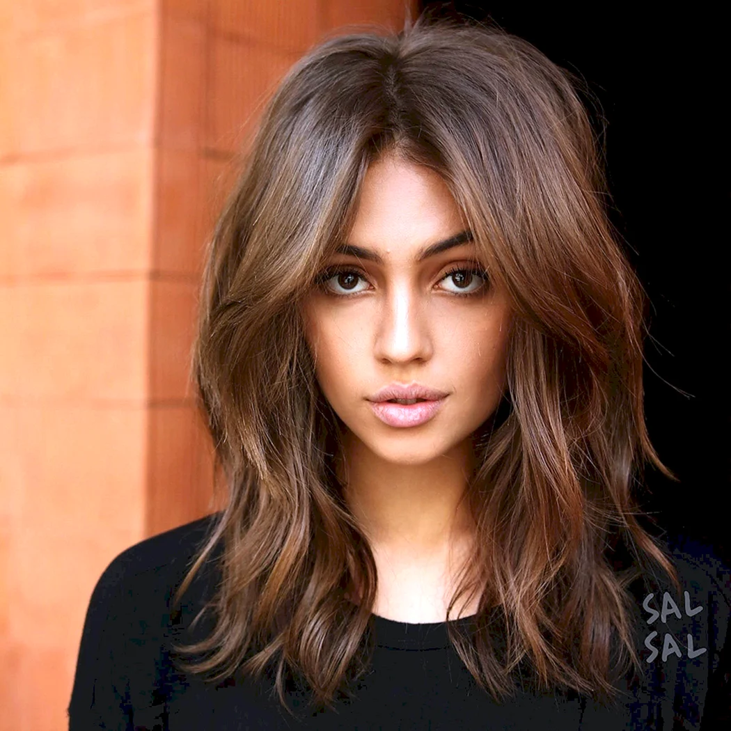 Стрижки жіночі на довге волосся