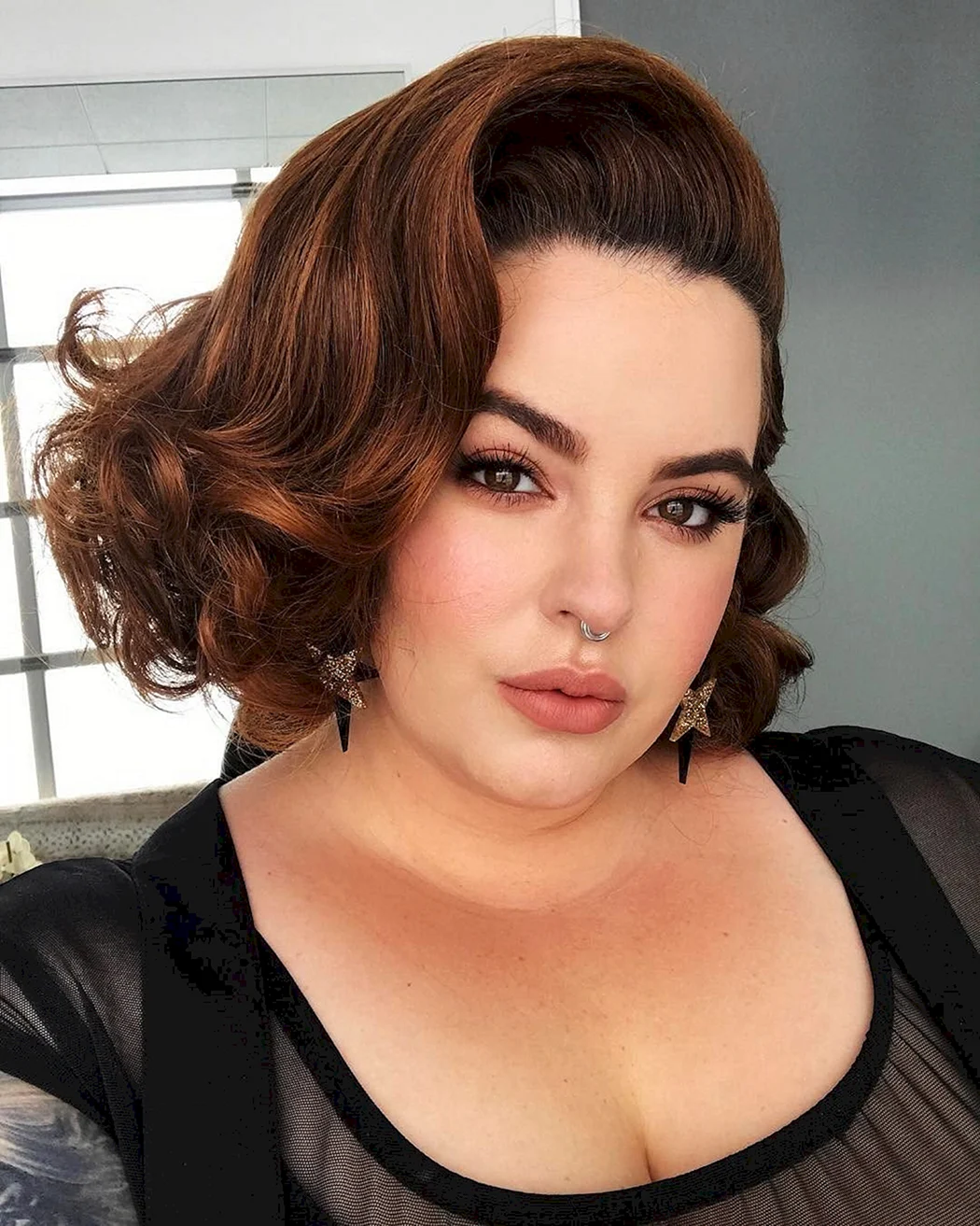 Тесс Холідей