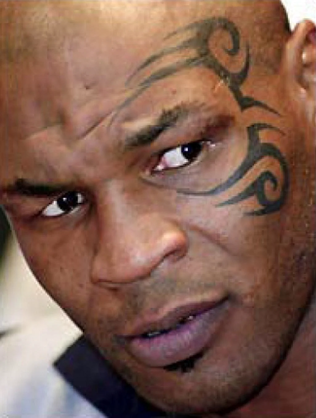 Майк Тайсон тату на лице