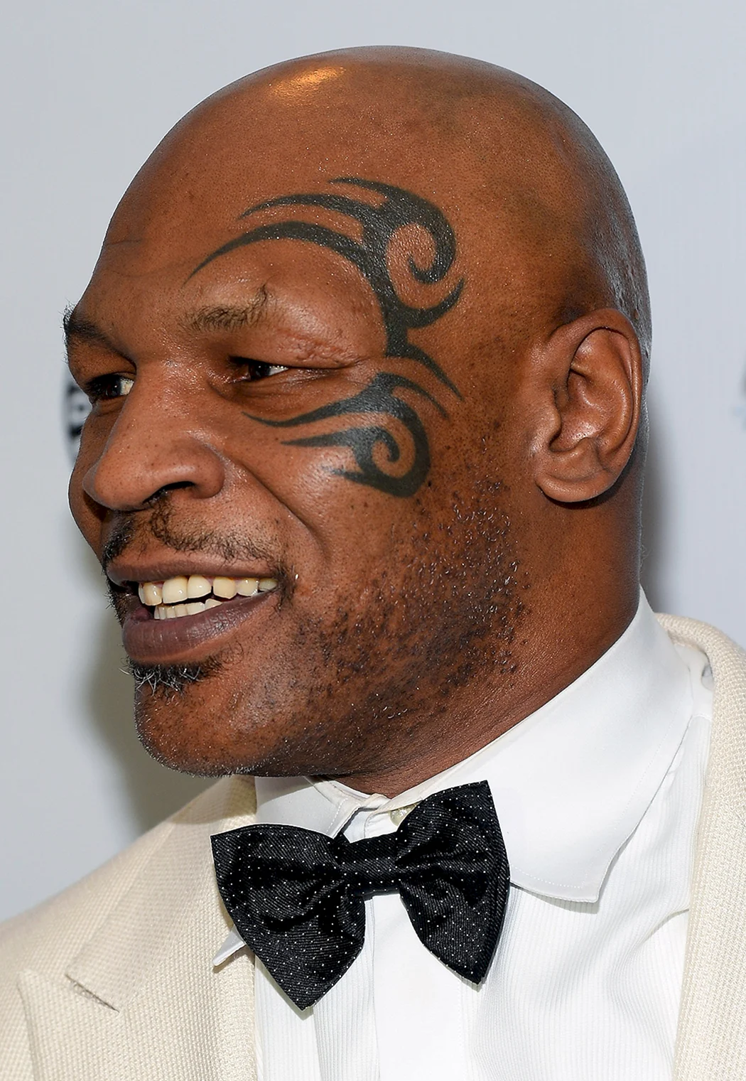 Майк Тайсон тату на лице