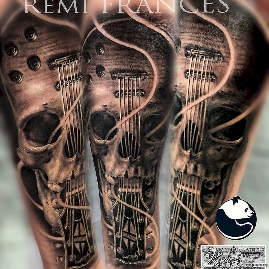 Тату череп с гитарой на руке