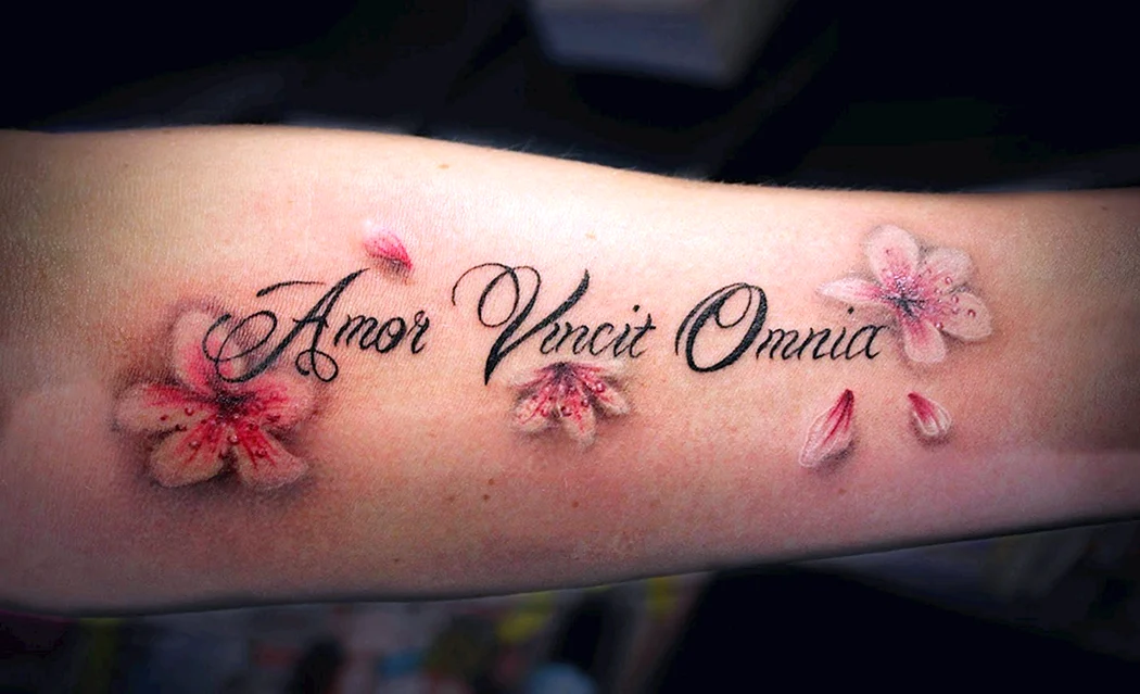 Amor vincit Omnia тату