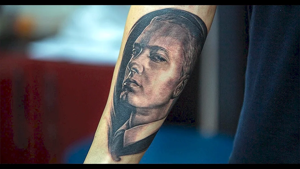 Тату Оксимирона