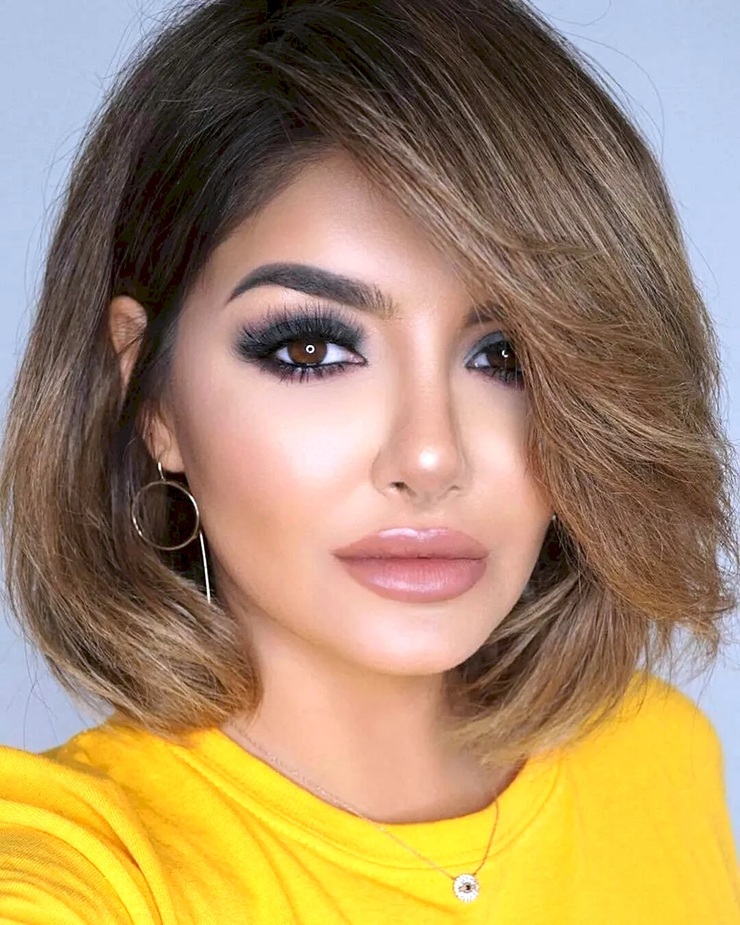 Стрижки с карими глазами