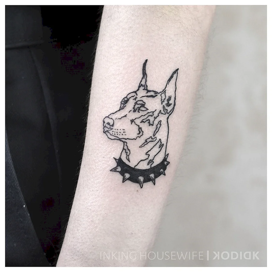 Тату Доберман