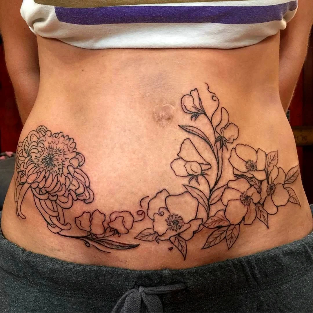 Тату на животе для девушек на растяжках