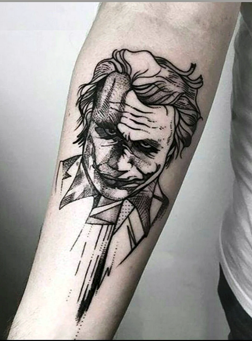 Тату Джокер