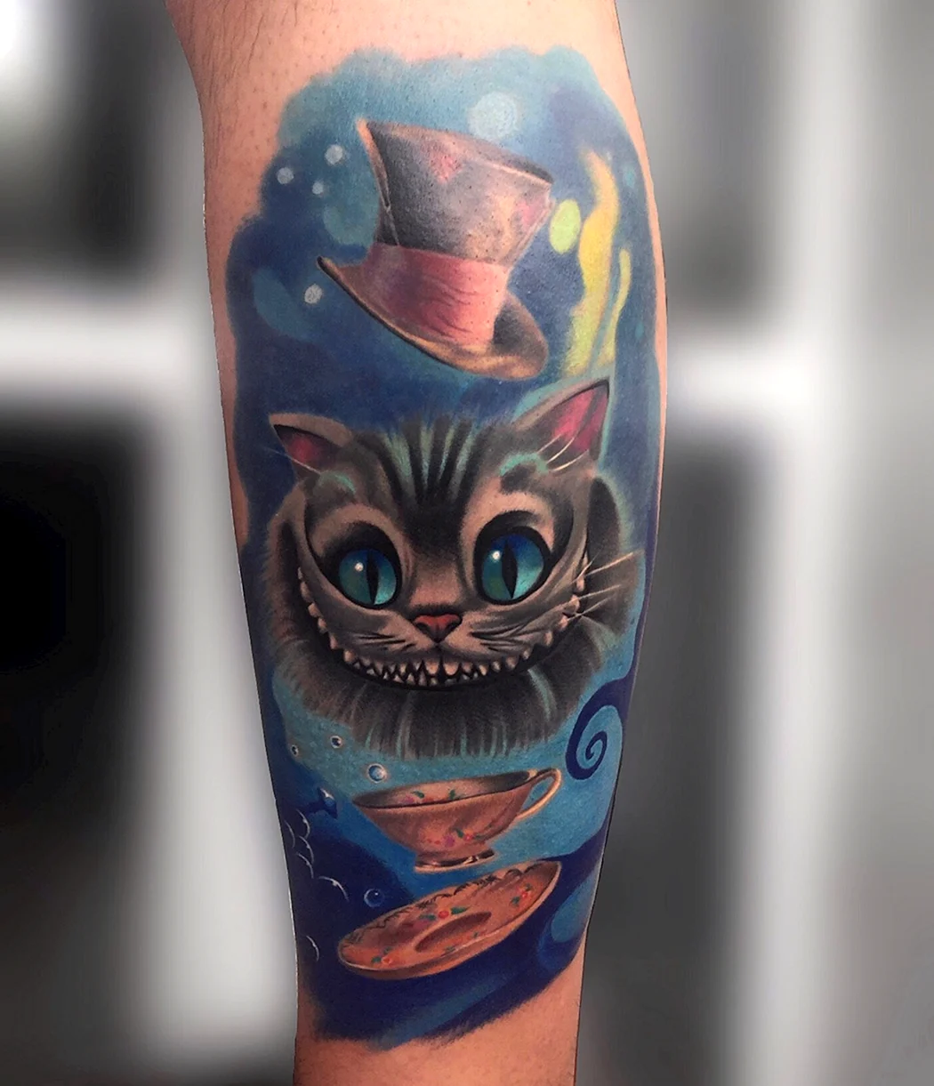 Тату Чеширский кот на предплечье