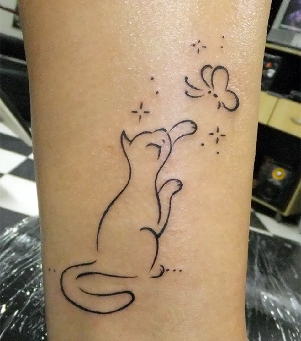 Тату в виде кошки