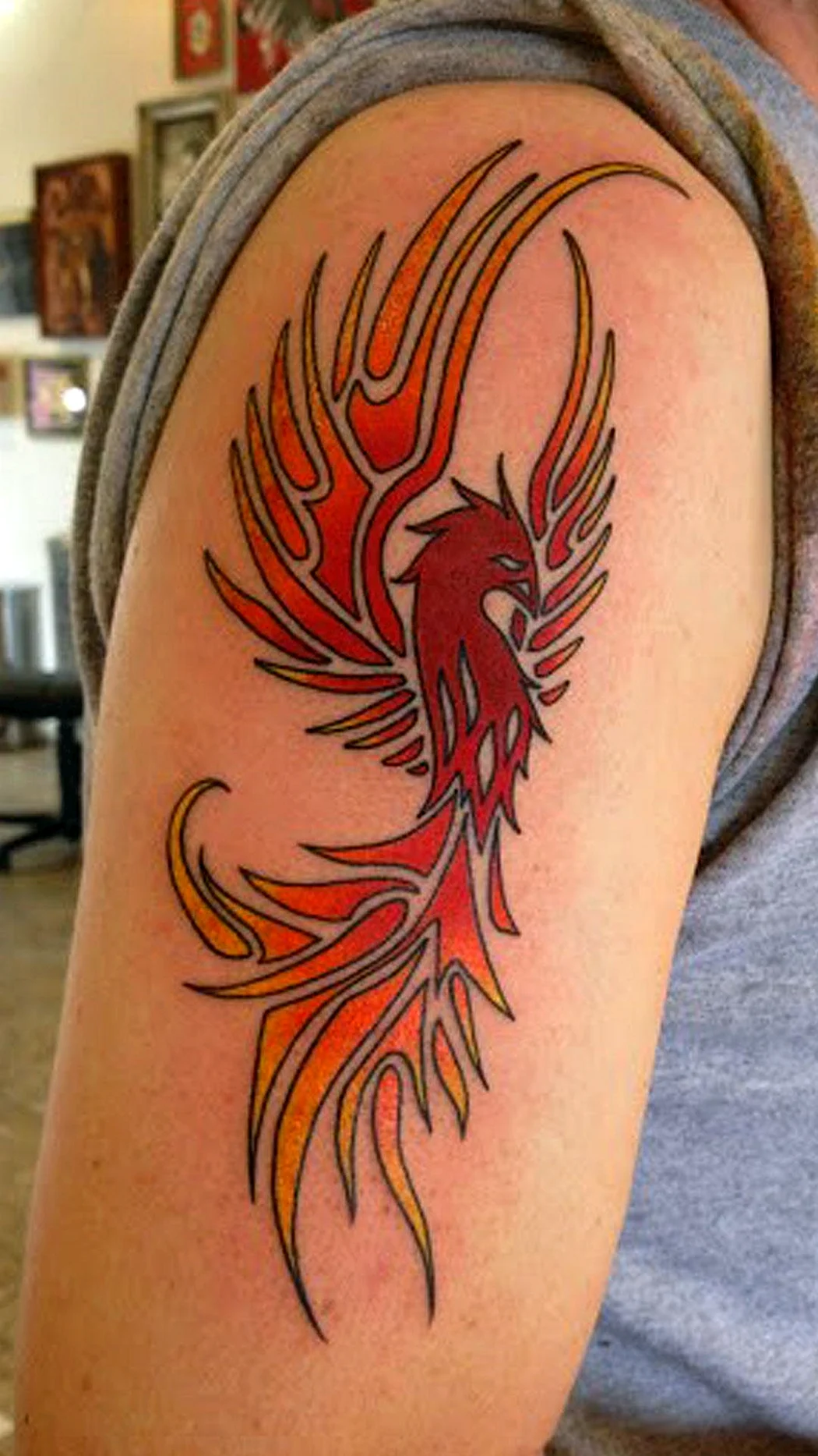 Тату птица Феникс для мужчин