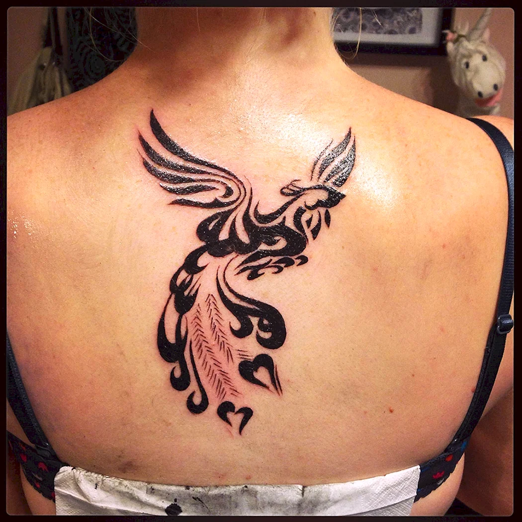 Птица Феникс тату на спине