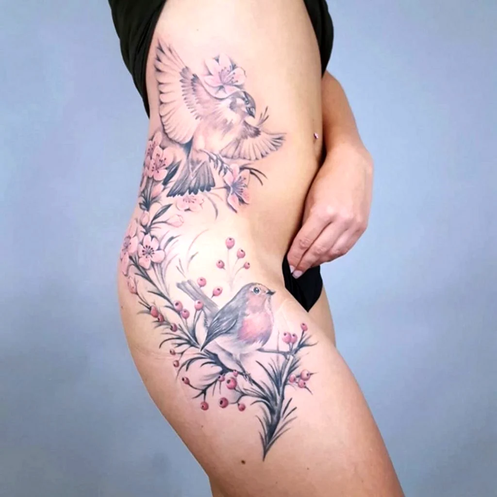 Тату на бедре для девушек животные