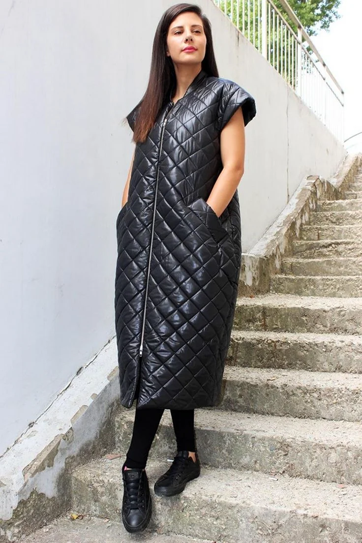 Стеганные жилетки женские длинные