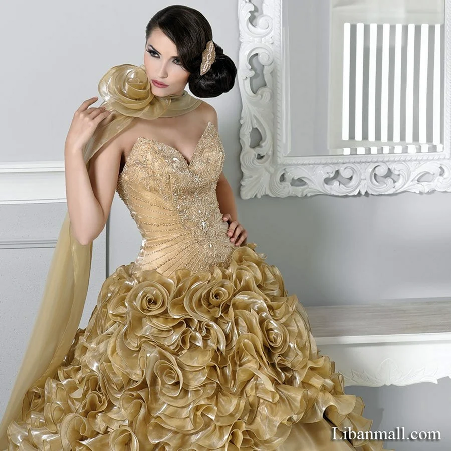 Свадебные платья золотого цвета