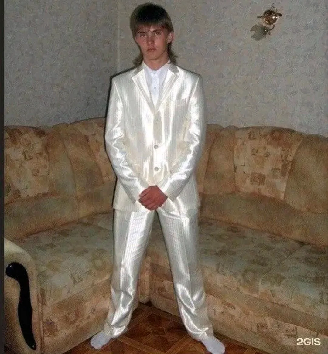 Колхозник в белом костюме