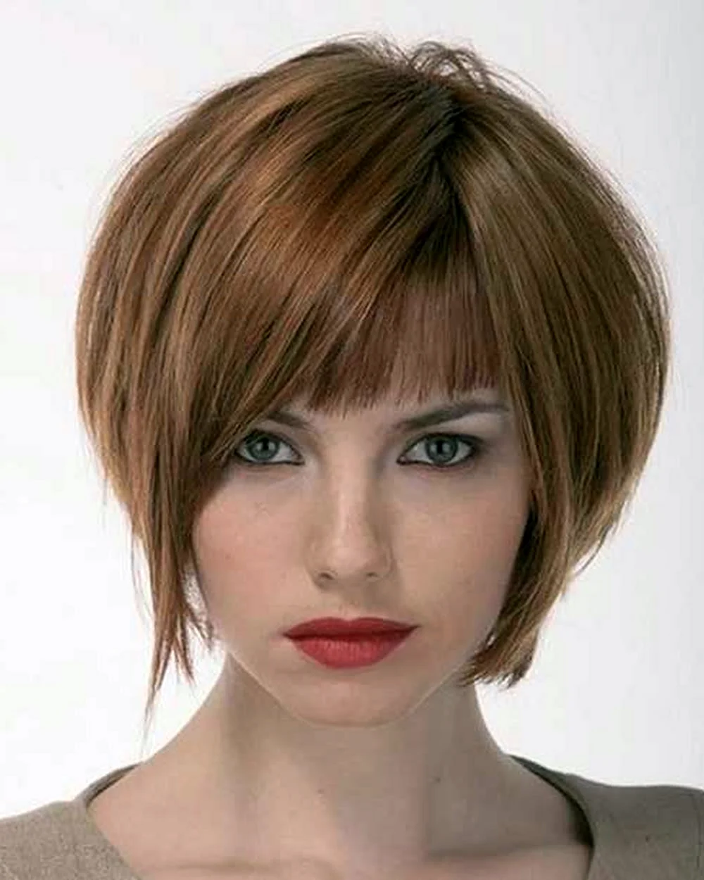 Стрижка layered short Bob