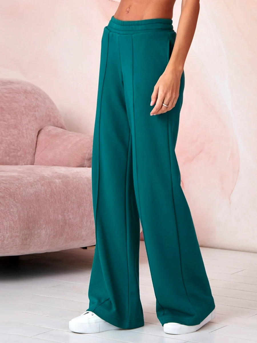 Зеленые брюки палаццо