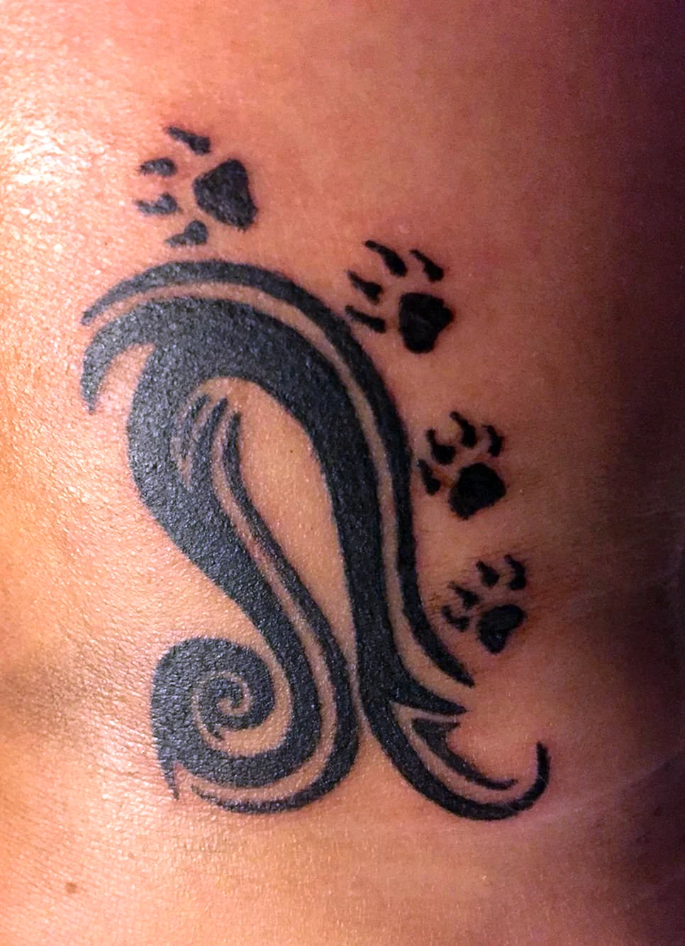 Тату трайбл знак зодиака Лев