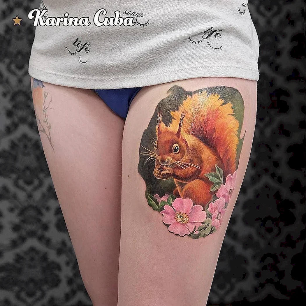 Тату белка на ноге